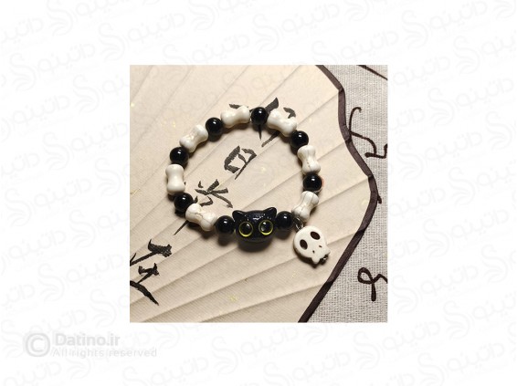 عکس دستبند زنانه مهره ای طرح گربه سیاه انیمه ای و آویز جمجمه 19874 - انواع مدل دستبند زنانه مهره ای طرح گربه سیاه انیمه ای و آویز جمجمه 19874