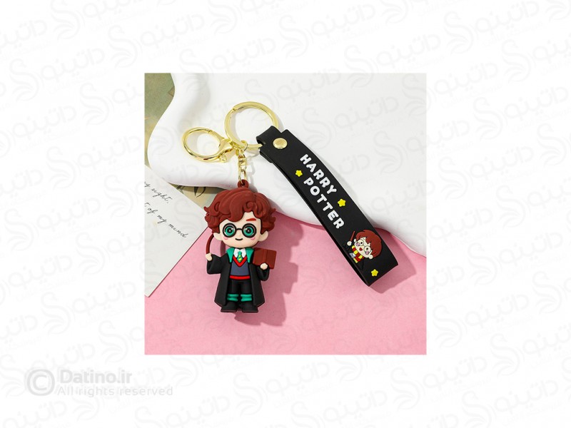 عکس جاکلیدی سیلیکونی طرح هری پاتر با ردای هاگوارتز 20665 - انواع مدل جاکلیدی سیلیکونی طرح هری پاتر با ردای هاگوارتز 20665